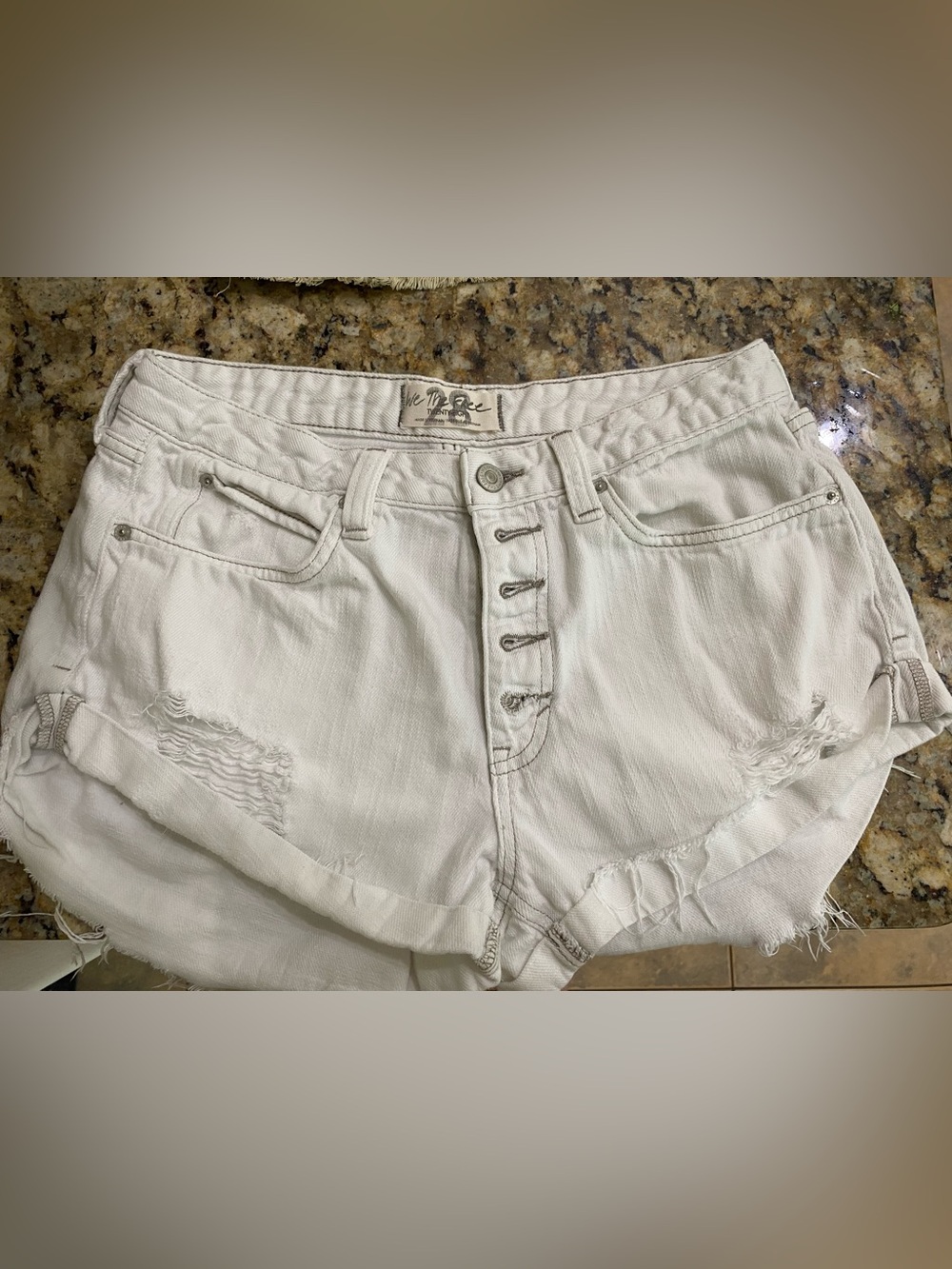 We The Free White Button-Fly Rolled Hem Distressed Denim Shorts